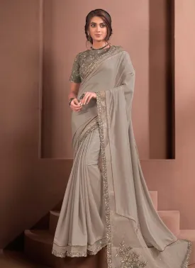 Aesthetic Look Beige Color Silk Fabric Zari Work Saree With Dark Color Designer Blouse