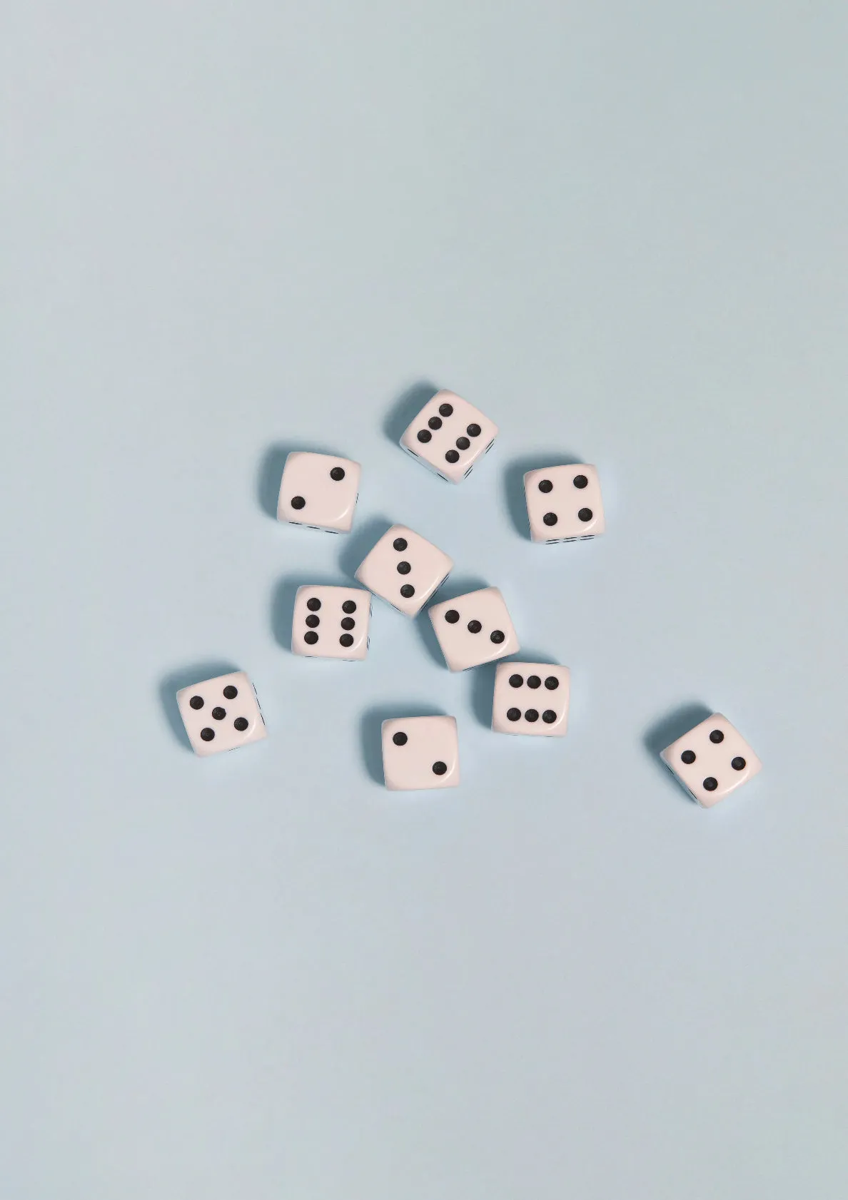 Black-and-white dices on a light blue background / Pop art style photo print