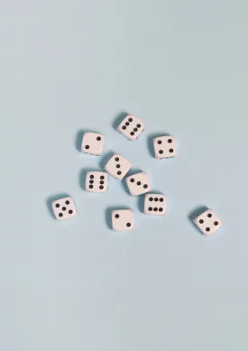 Black-and-white dices on a light blue background / Pop art style photo print