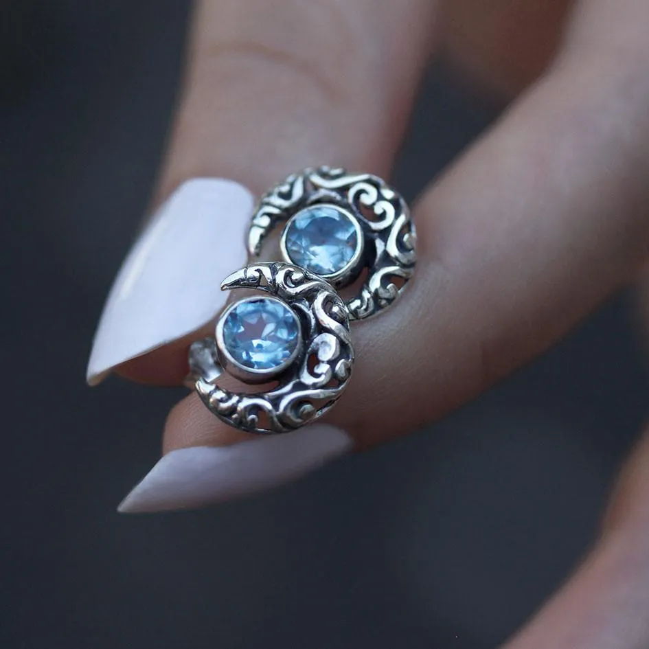 WISDOM. Silver Moon Crescent Earrings - Blue Topaz